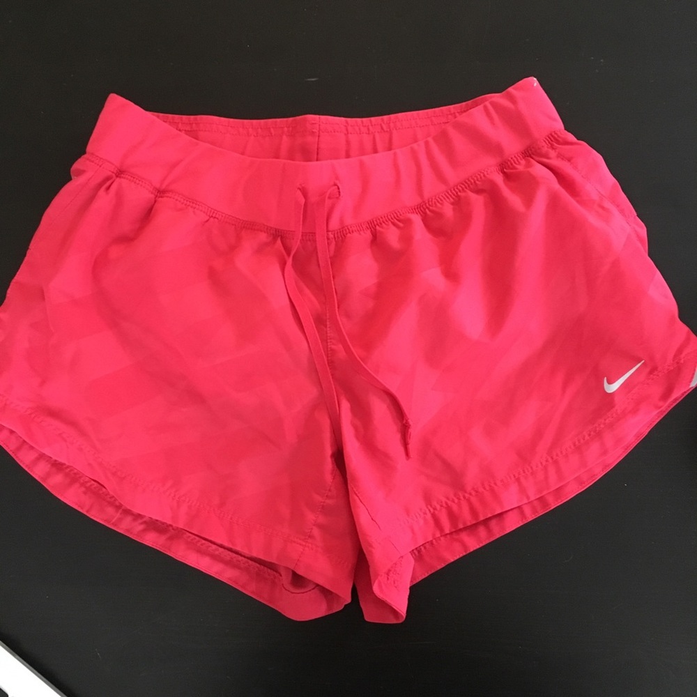 Hot pink Nike running shorts